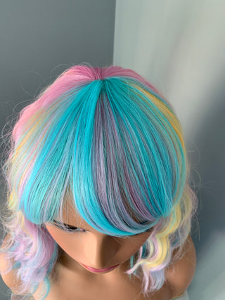"Cassandra" - Pastel Rainbow Bodywave Wig with Bangs