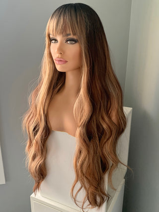 "Carmen" - Long Highlighted Brown Body Wave Wig with Bangs