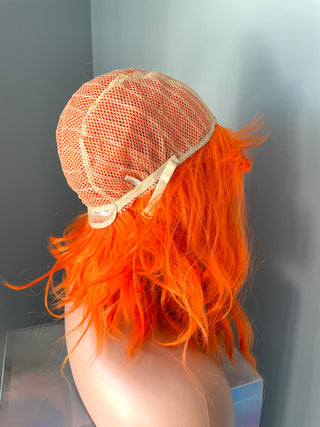 "Rae" - Short Neon Orange Wig With Bangs