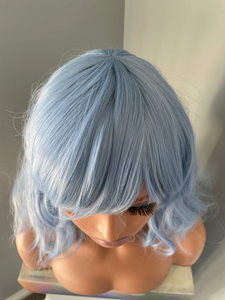 "Faye" - Short Pastel Blue Body Wave Wig with Bangs