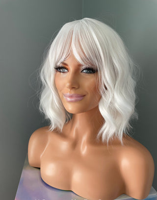 "Cleo" - Short White Blonde Body Wave Wig with Bangs