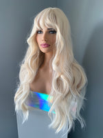 "Gwen" - Long Blonde Layered Beach Wave Synthetic Wig with Bangs