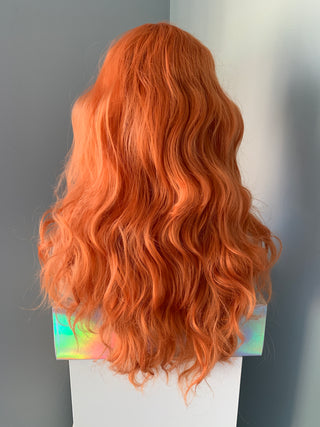 "Hazel" - Curly Auburn Orange Wig with Bangs