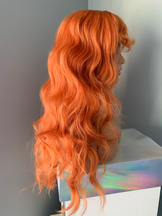 "Hazel" - Curly Auburn Orange Wig with Bangs