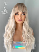 "Blaire" - Ash Blonde Beach Wave Synthetic Wig with Bangs
