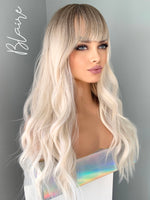 "Blaire" - Ash Blonde Beach Wave Synthetic Wig with Bangs