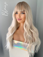 "Blaire" - Ash Blonde Beach Wave Synthetic Wig with Bangs