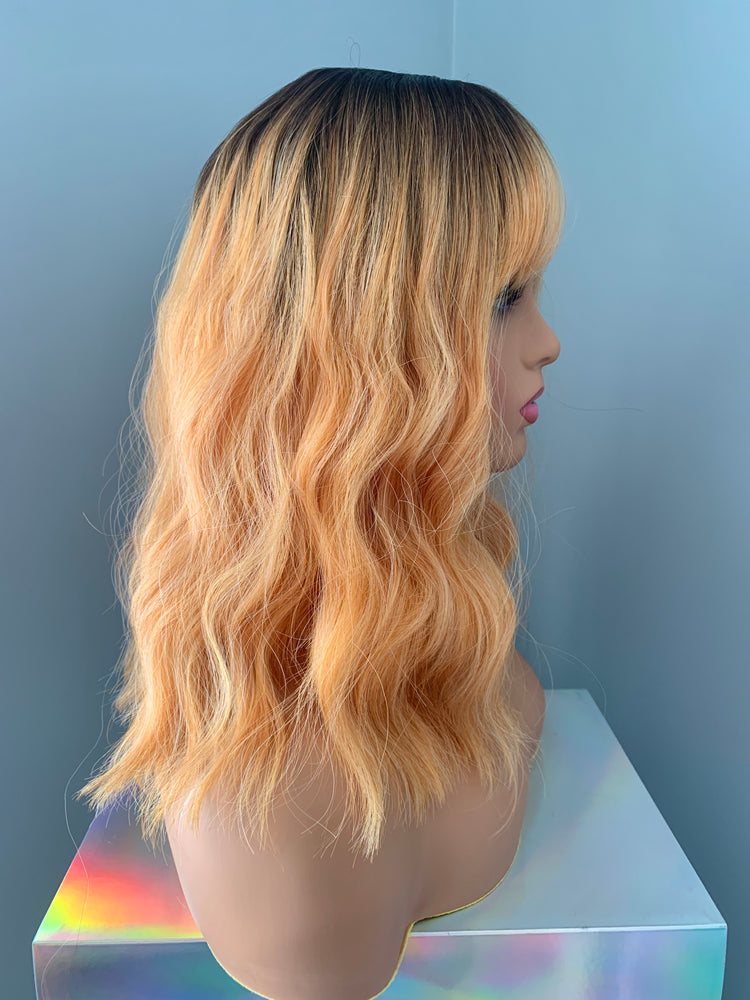 "Cora" - Coral Peach Synthetic Wig with Bangs