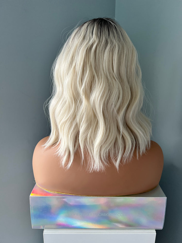 "Lilah" - Short White Blonde Synthetic Body Wave Wig with Bangs